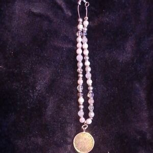 Elegant Beaded Necklace with Gold Pendant